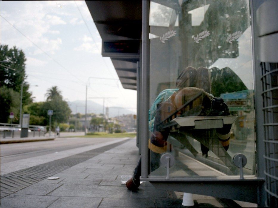 sleeping at the tram station | by bertram rusch